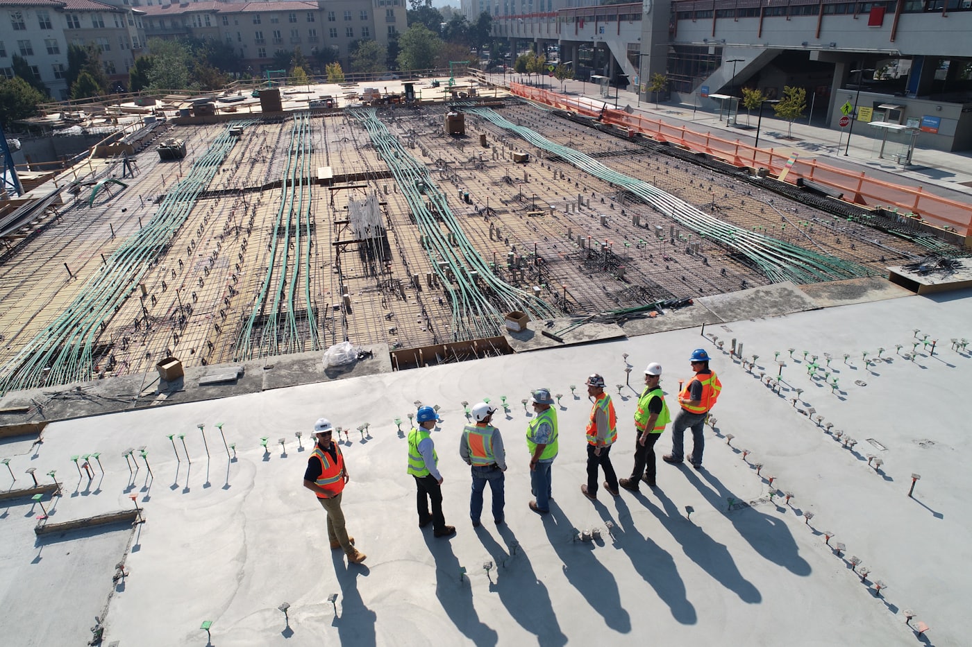 Electrical crew working on a commercial rooftop installation