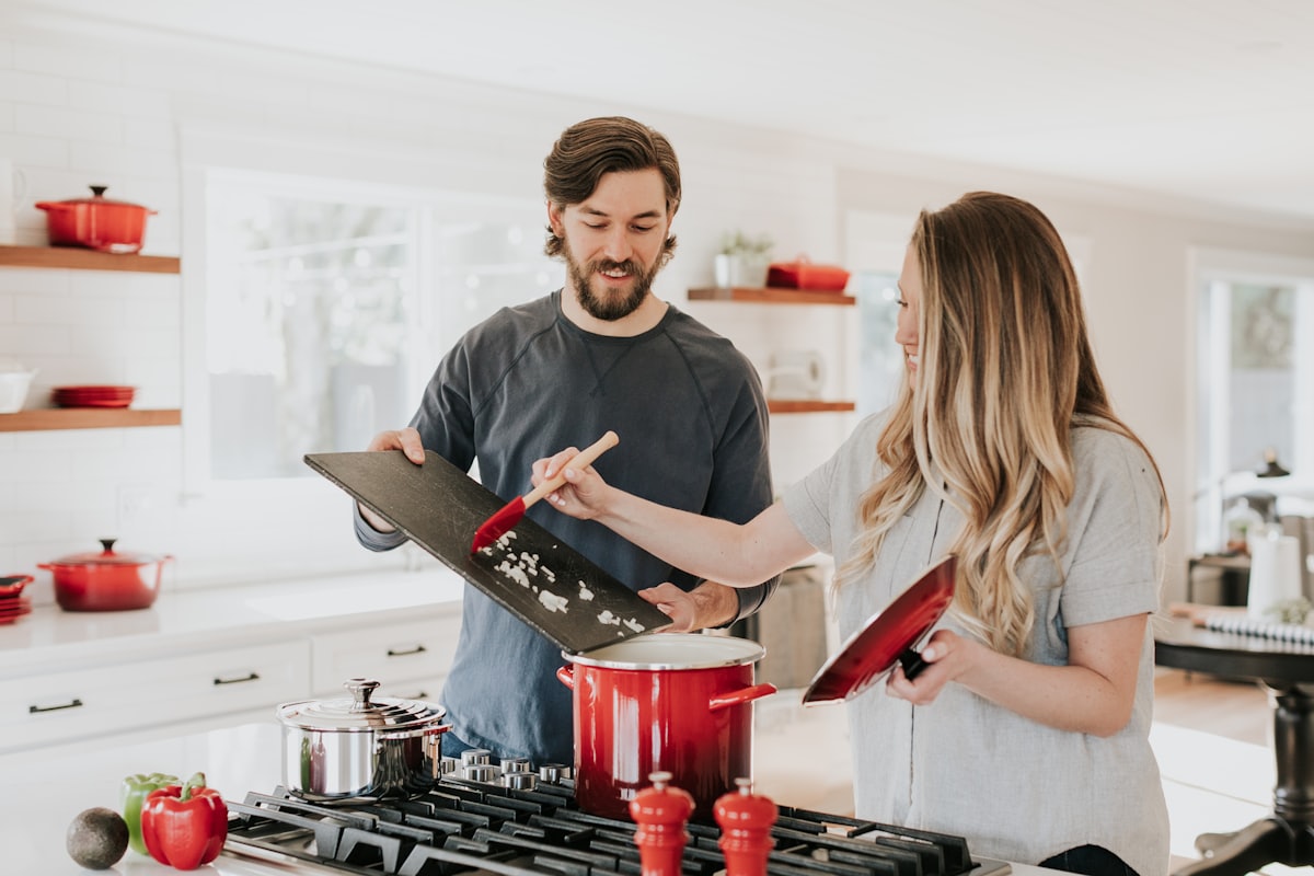 Couple cooking in a bright modern kitchen