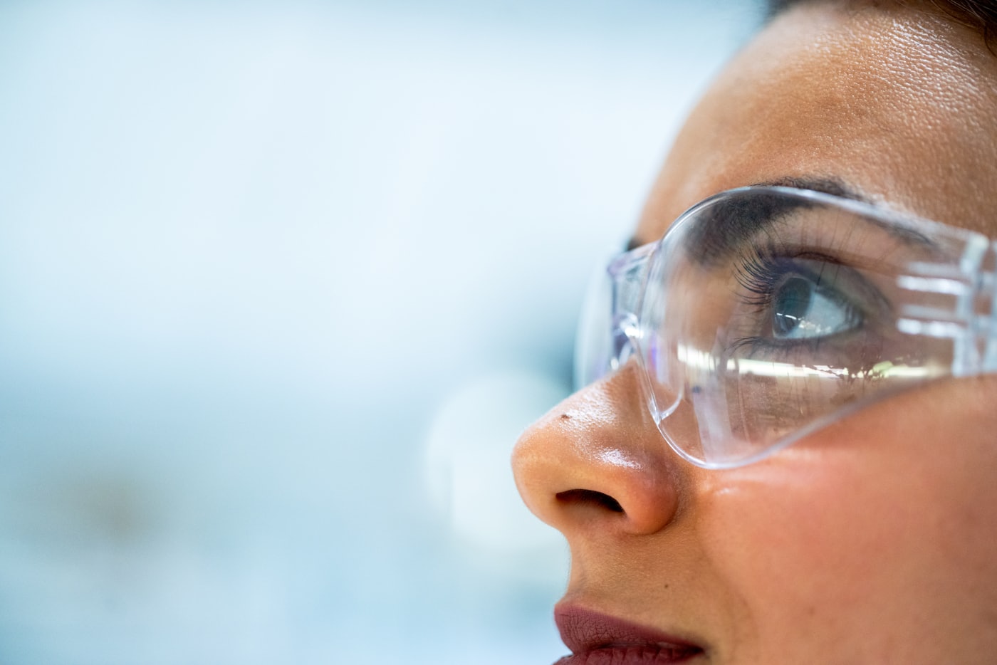 Close-up of safety eyewear worn on an electrical job site
